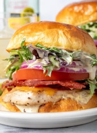 A Grilled Chicken Sandwich on a white plate.