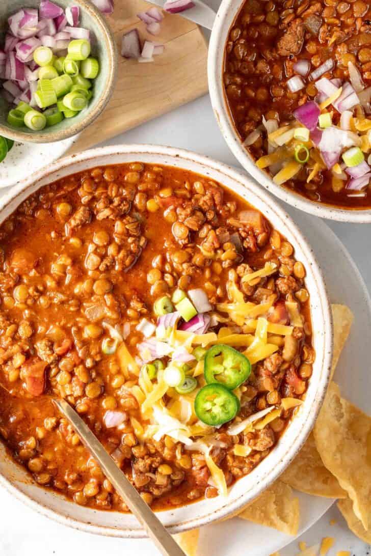 Two bowls filled with turkey lentil chili.