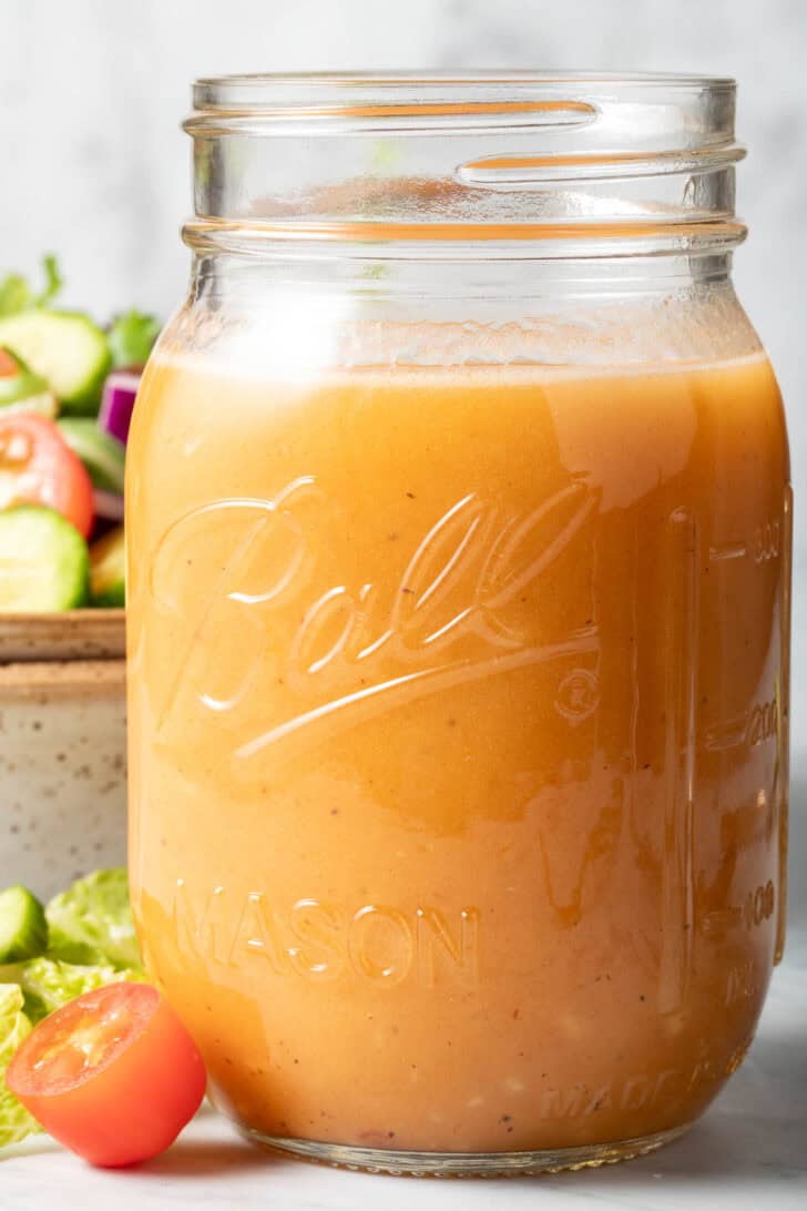 A clear mason jar filled with Chipotle Vinaigrette.