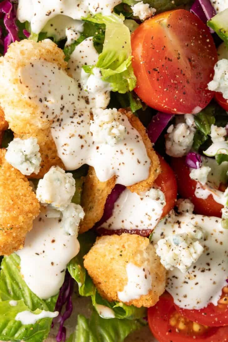 A green salad tossed with Blue Cheese Dressing.