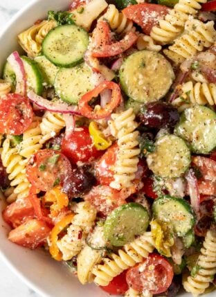 A white bowl filled with Zesty Italian Salad.