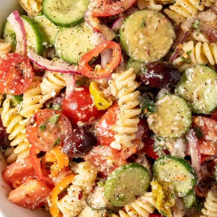 A white bowl filled with Zesty Italian Salad.