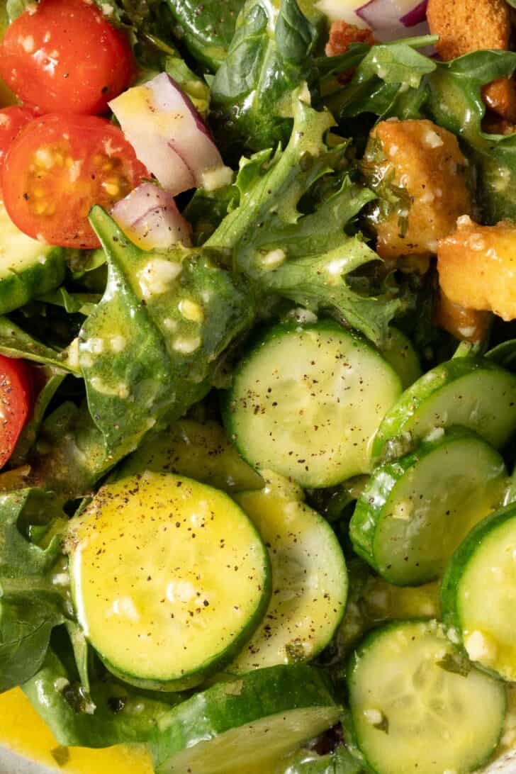 A mixed green salad tossed with Orange Juice Vinaigrette Dressing.