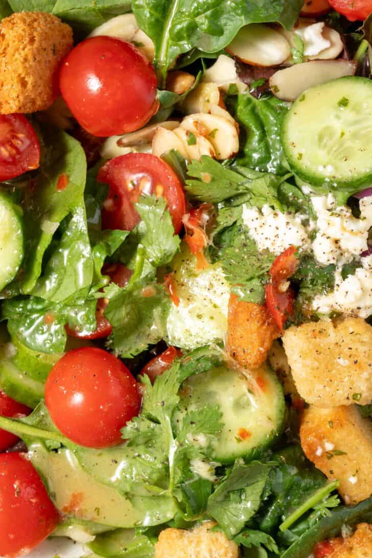 A green salad tossed with Asian Salad Dressing