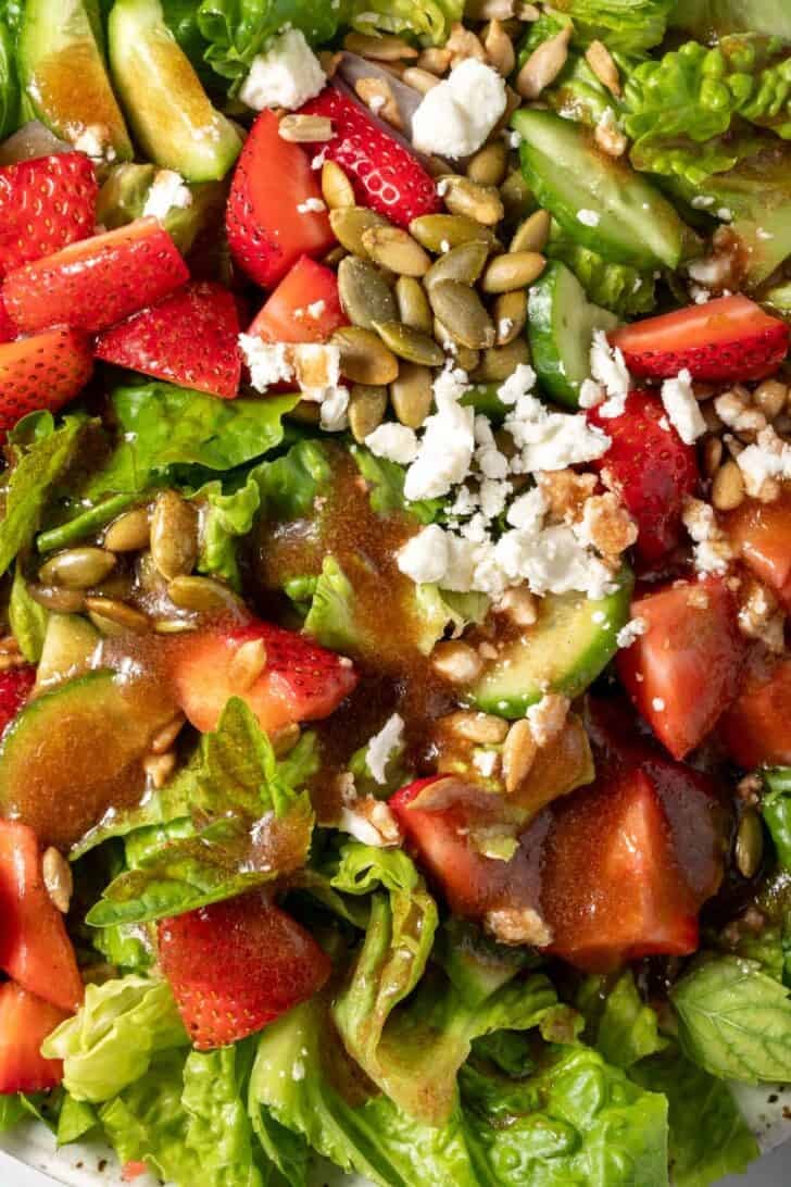 A green salad tossed with Pomegranate Balsamic Vinaigrette.