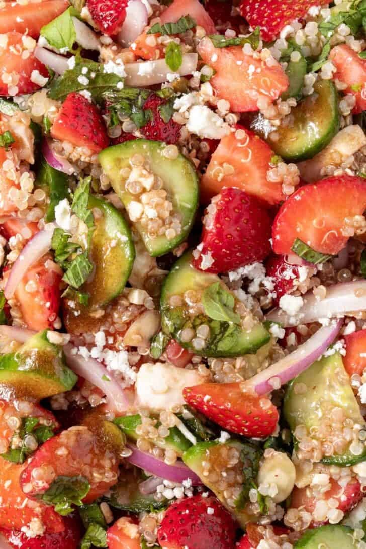 A bowl filled with Strawberry and Quinoa Salad.