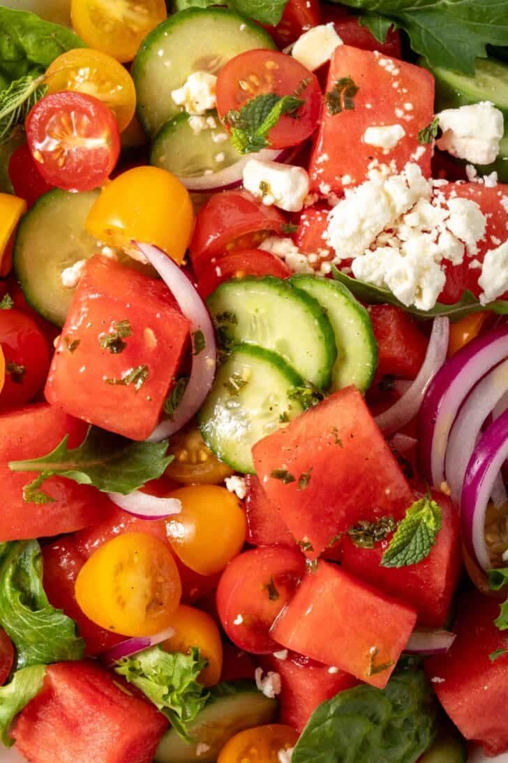 A bowl filled with Watermelon Cucumber Salad.