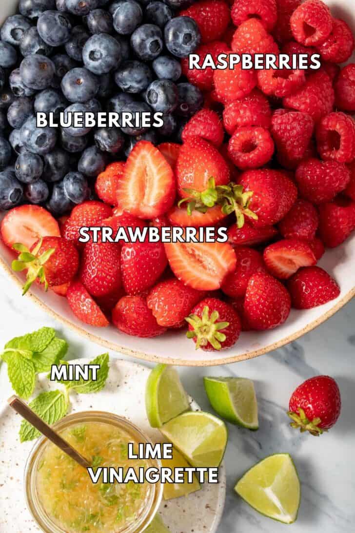 Raspberries, Strawberries and blueberries in a bowl.