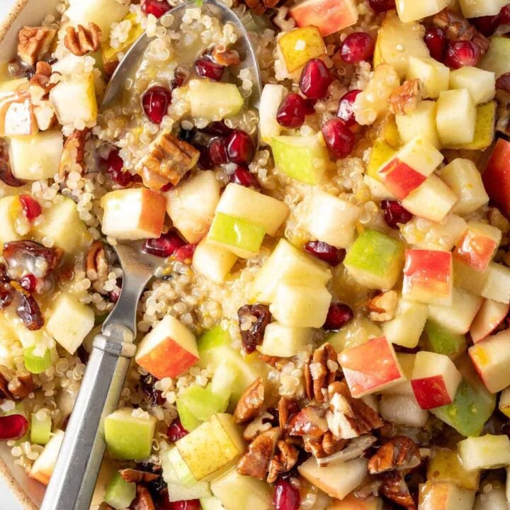 Fall Quinoa Salad with apples and cranberries in a bowl.