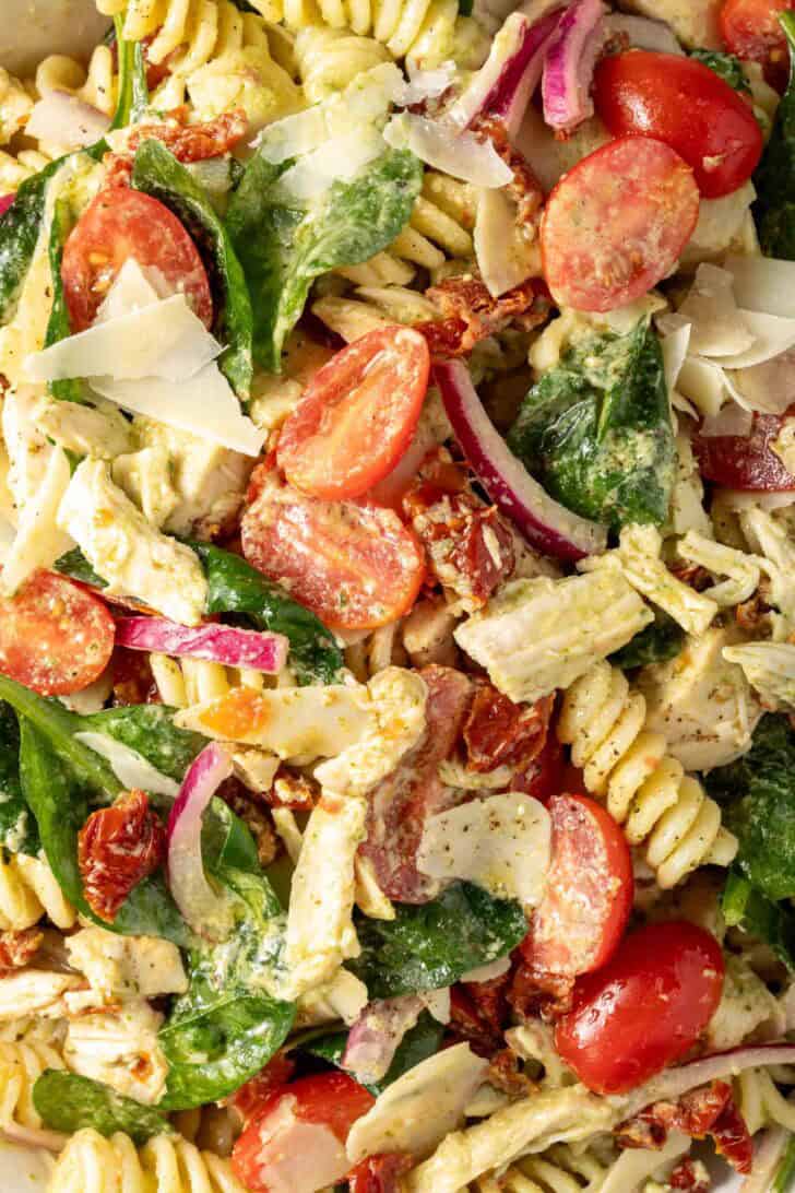 Pesto Chicken Pasta Salad in a bowl.