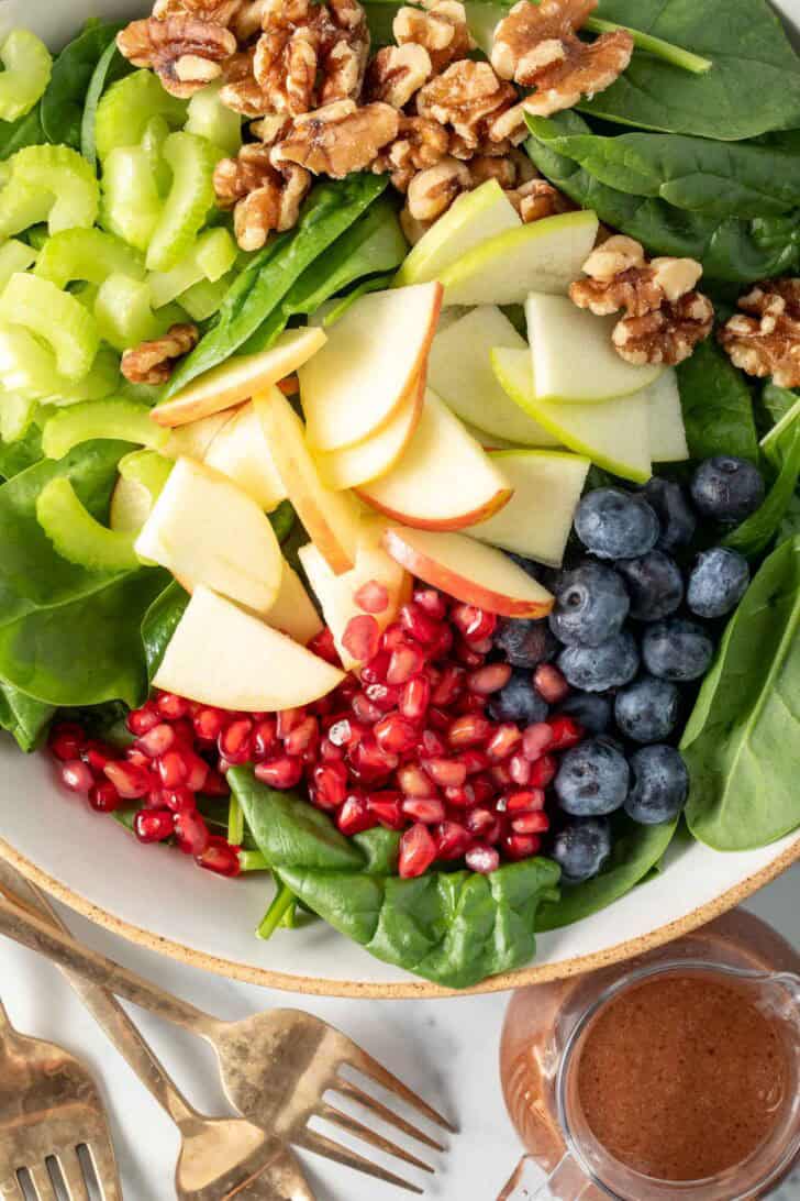 Apple Spinach Salad in a bowl.
