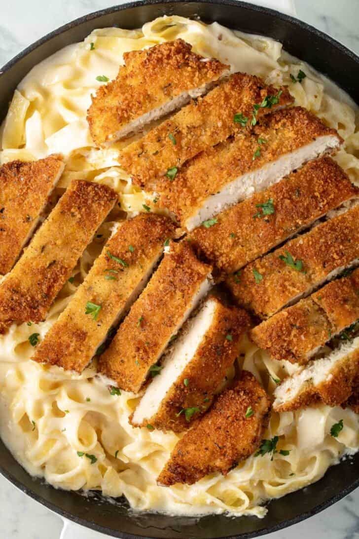 Chicken Fettuccine Alfredo in a skillet.
