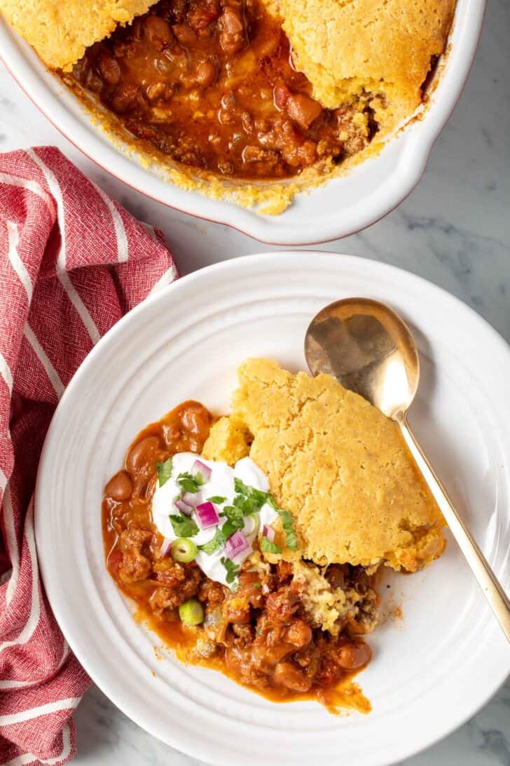 Chili and Cornbread Casserole in white bowl.