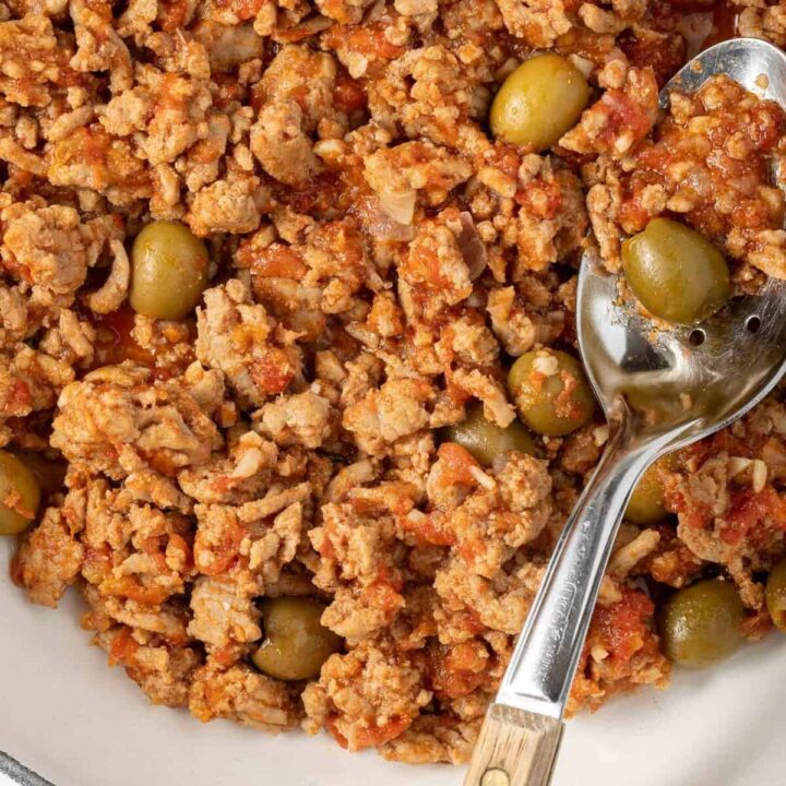 Cuban Picadillo in a white skillet.