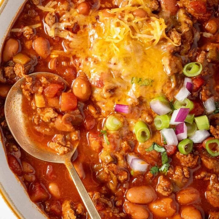 Easy Turkey Chili in a white bowl with a spoon.