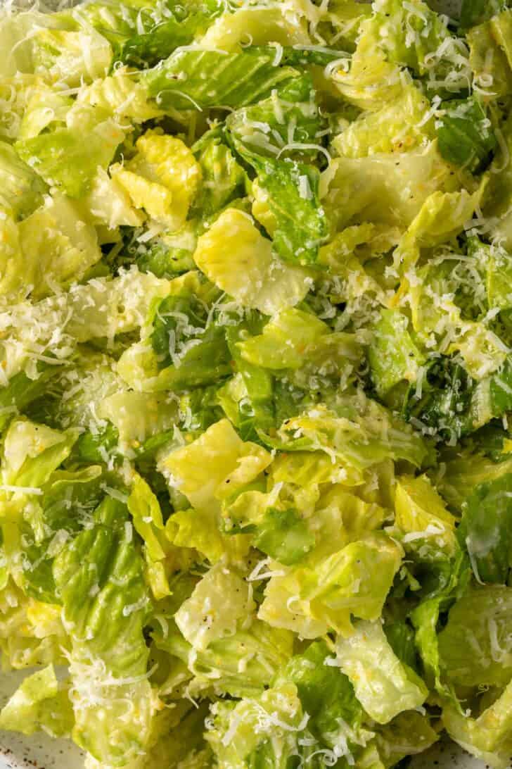 Lemon Parmesan Lettuce Salad in a white bowl.