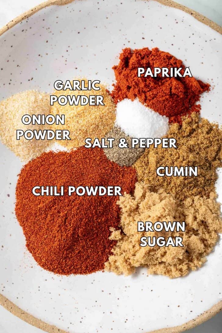 Homemade Mild Taco Seasoning on a white dish.