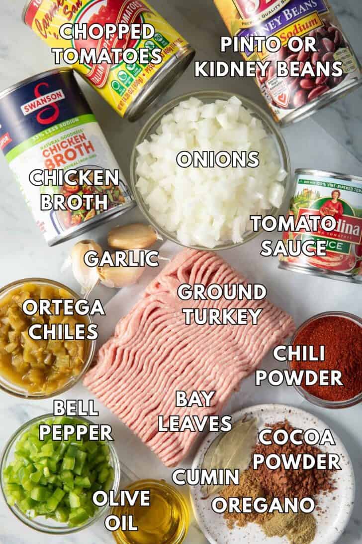 Canned chicken broth, chopped tomatoes, kidney beans and tomato sauce for easy chili recipe.