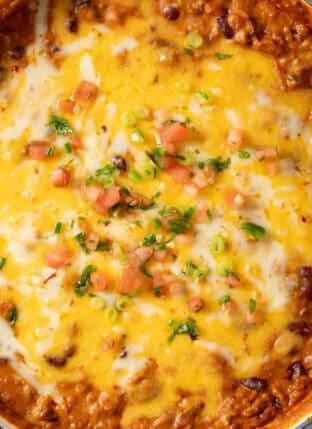 Chili Cheese Dip in a white pan.