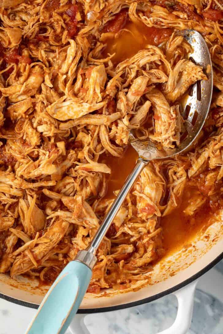 Shredded Mexican Chicken Shredded Mexican Chicken in a Dutch oven.