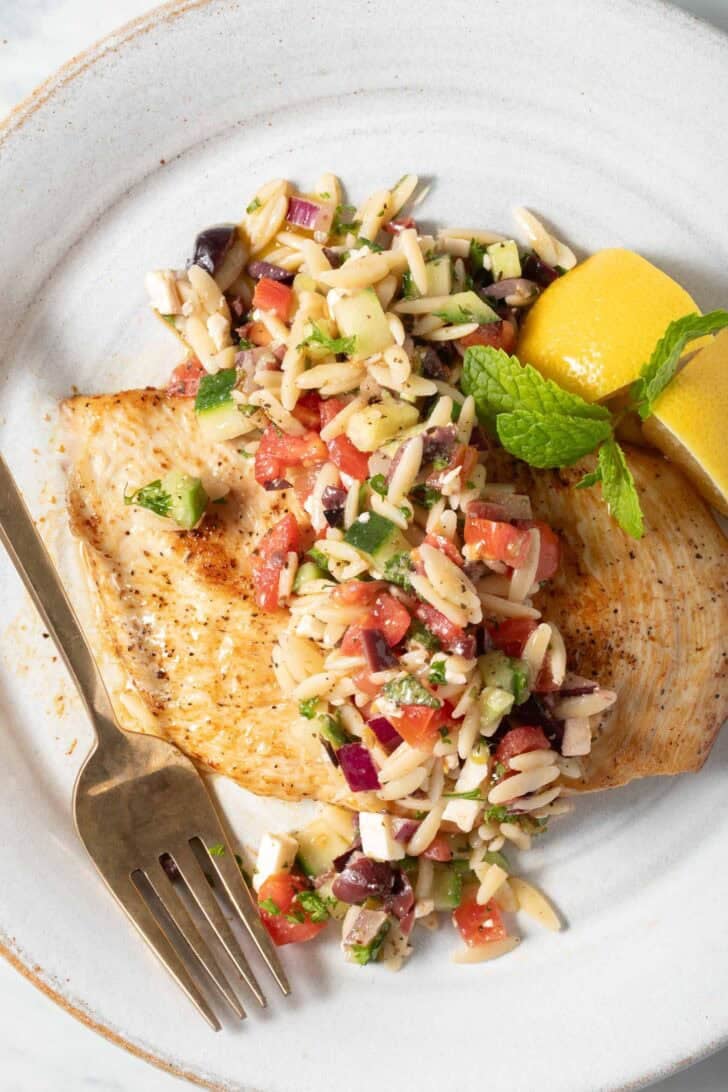 Greek Orzo Salad Recipe Greek Orzo Salad with grilled chicken breast.