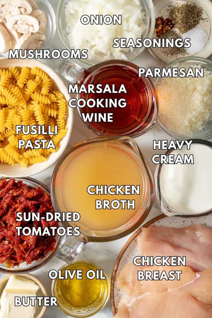 Marry Me Chicken Pasta Ingredients Marry Me Chicken Pasta Ingredients in glass bowls (chicken, sun-dried tomatoes, mushrooms, Parmesan cheese, cream).