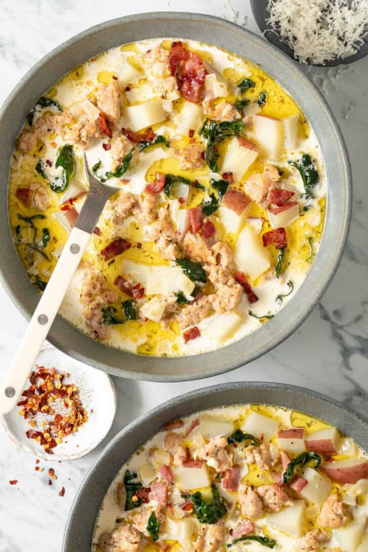 Copycat Olive Garden Zuppa Toscana Two bowls of Copycat Olive Garden Zuppa Toscana soup.