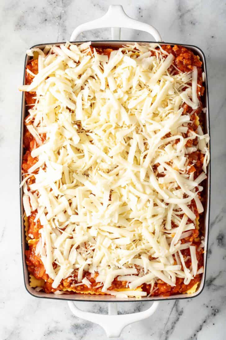 Ravioli with Lasagna Ravioli with Lasagna in a white baking dish.