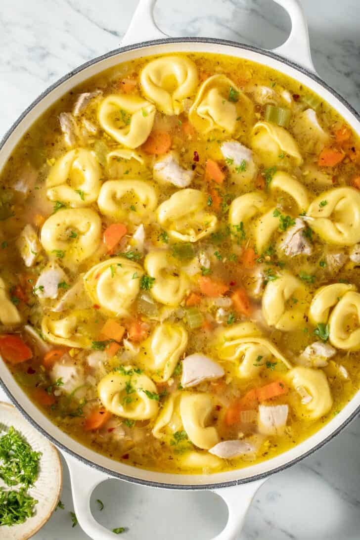 Chicken Tortellini Soup Chicken Tortellini Soup in a white pot.