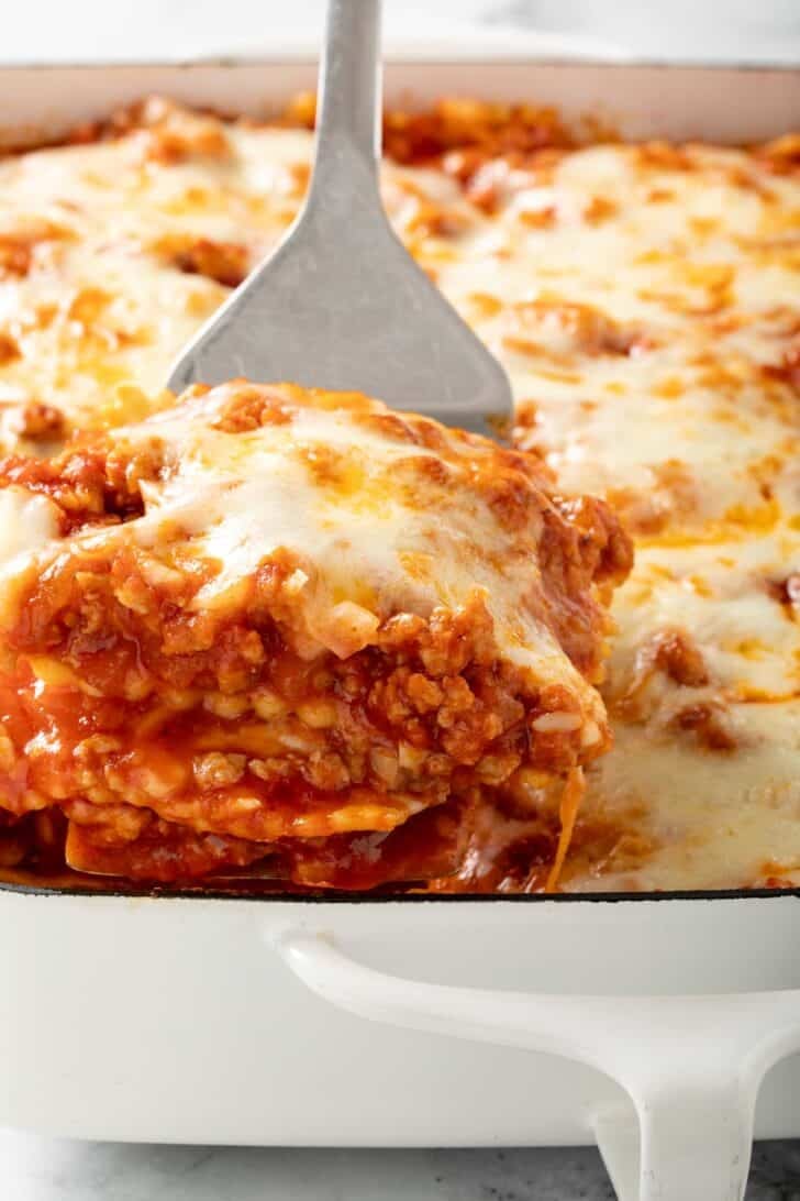 Baked Ravioli Lasagna Baked Ravioli Lasagna in a white baking dish.