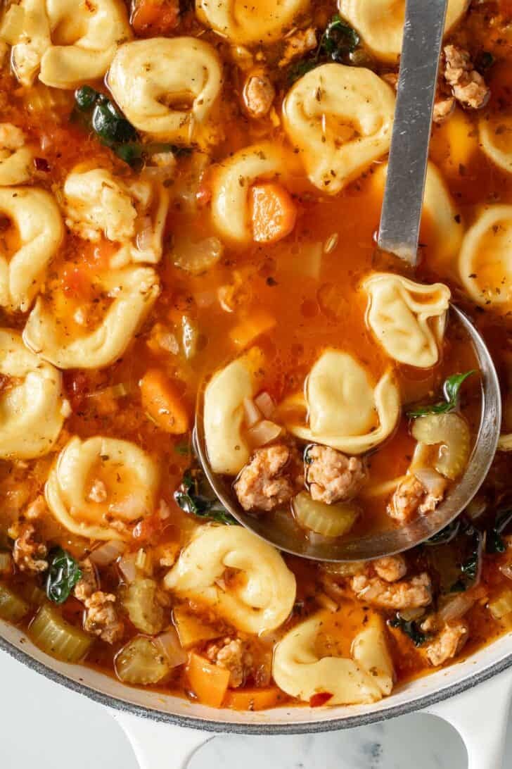 Sausage and Tortellini Soup Sausage and Tortellini Soup in a white pot.