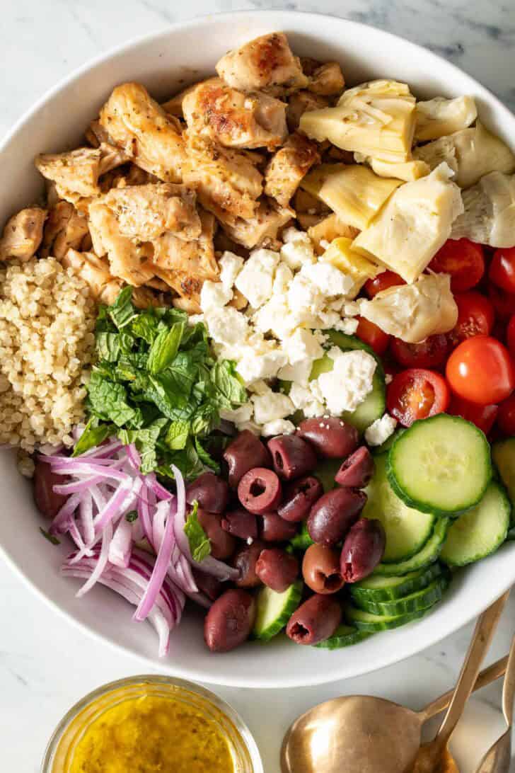 Chicken Quinoa Salad Chicken Quinoa Salad in a white bowl.
