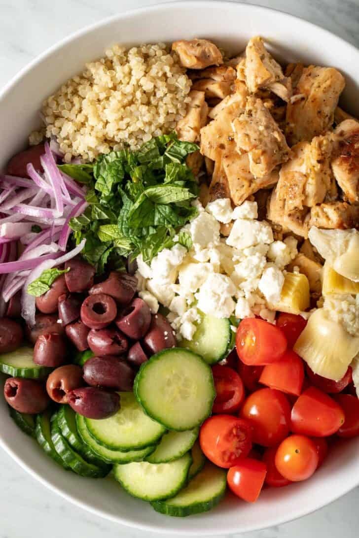 Chicken and Quinoa Salad Chicken and Quinoa Salad in a white bowl.