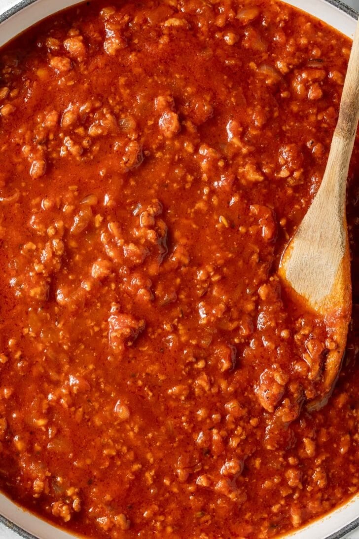 Meat Sauce Recipe Spaghetti Meat Sauce in a white Dutch oven.