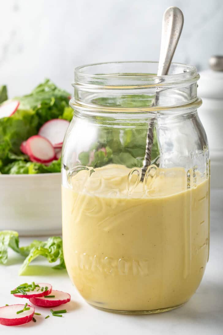 Dijon Vinaigrette Salad Dressing Dijon Vinaigrette Salad Dressing in a clear glass mason jar.