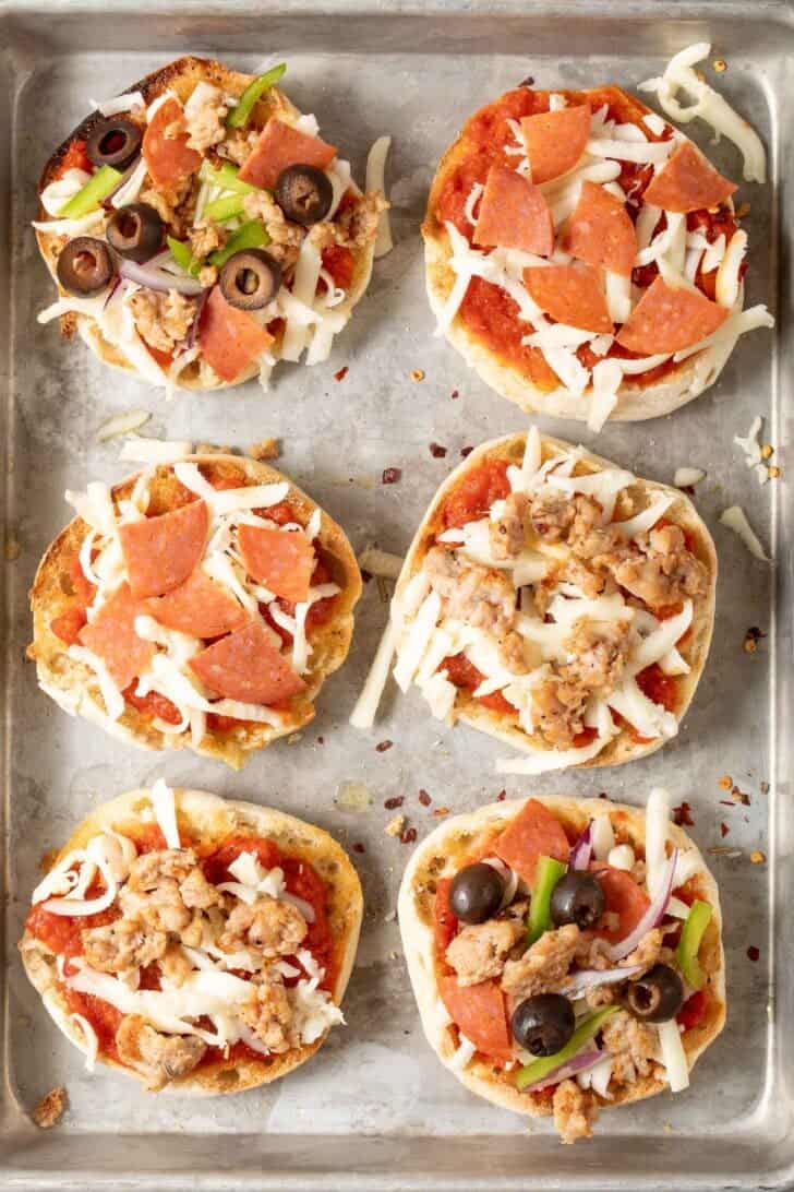 English Muffin Pizzas English Muffin Pizzas on a baking sheet.