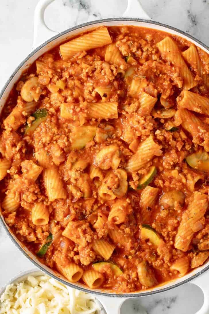 Ground Turkey Pasta Bake Ground Turkey and Pasta Bake in a white skillet.