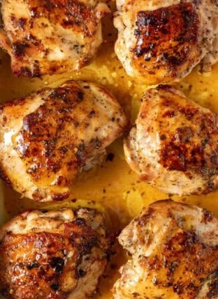 Italian Dressing Chicken in a white baking pan.