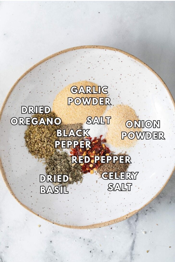 Italian Salad Dressing Mix Recipe Homemade Dry Italian Salad Dressing Mix ingredients in a small white dish.