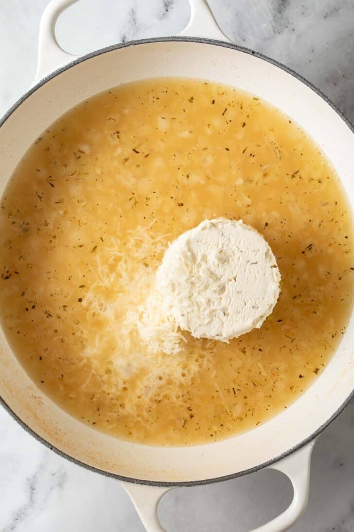 Boursin cheese sauce in a white skillet