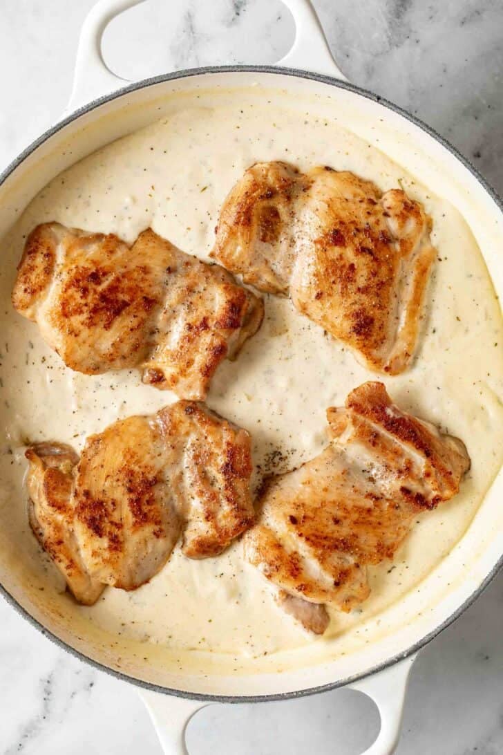 Boursin Chicken in a white skillet
