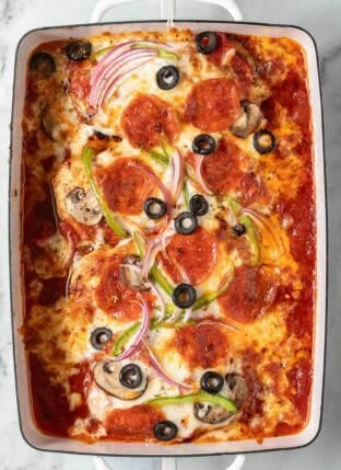 Pizza Chicken Bake in a white baking dish.