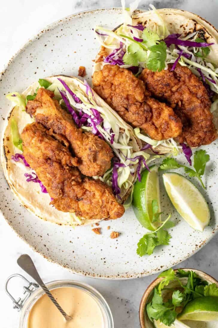 Crispy Chicken Taco Crispy Chicken Tacos on a plate.