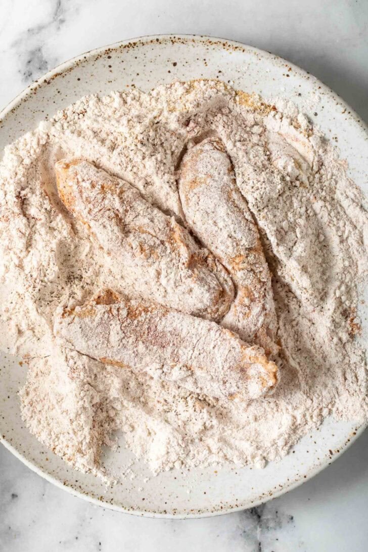 Fried Chicken Tacos Recipe Seasoned chicken thighs dredged in all purpose flour for fried chicken tacos.