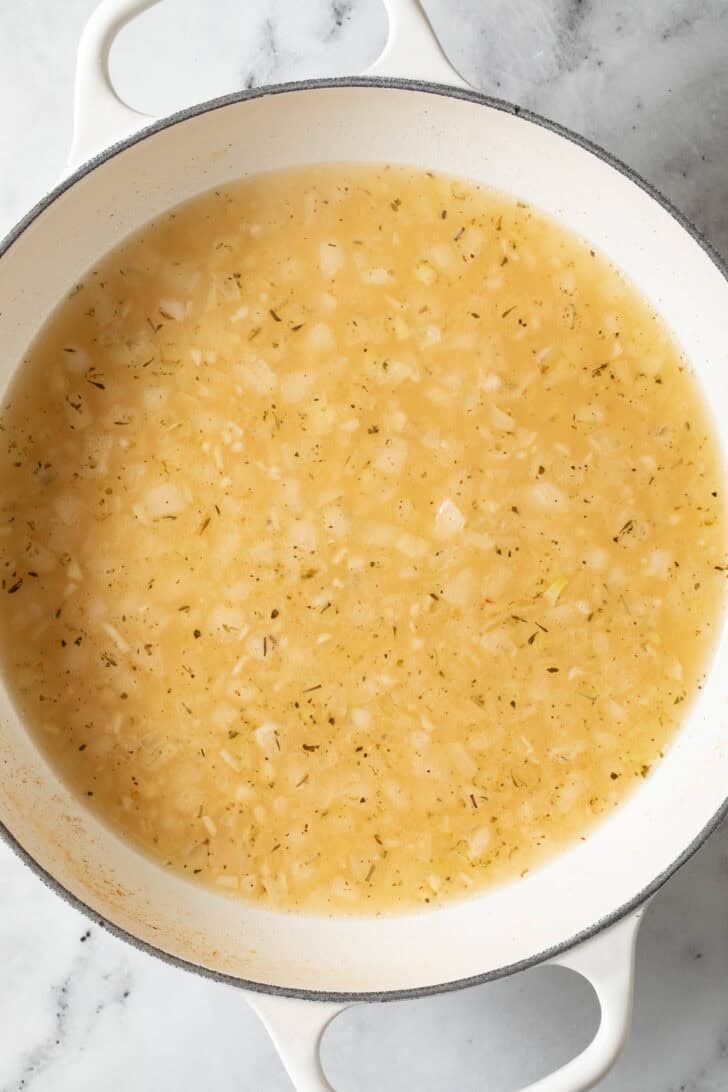 Boursin Chicken sauce in a white skillet.