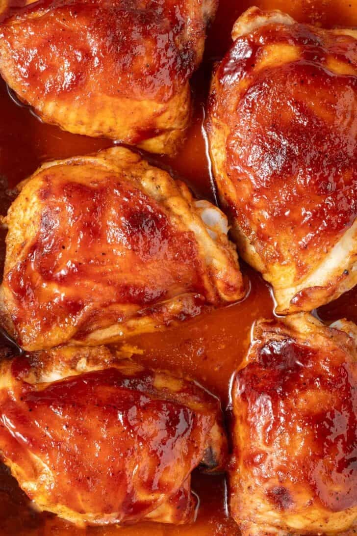Baked BBQ Chicken Thighs Baked BBQ Chicken Thighs in a baking dish.