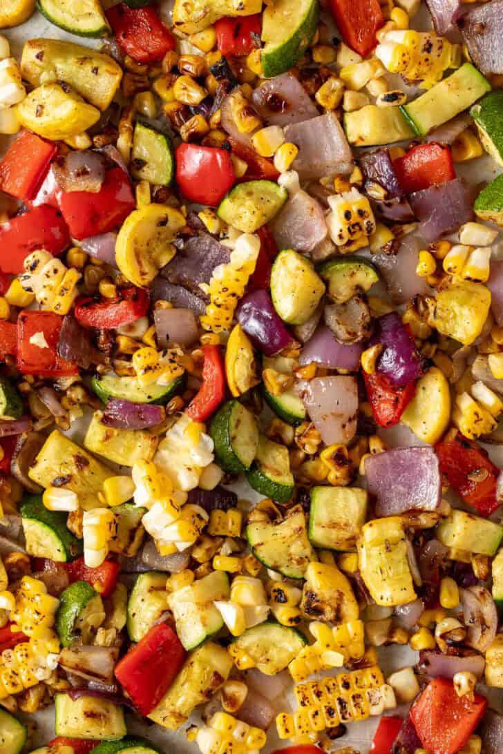 Summer Roasted Vegetables Roasted Summer Vegetables on a sheet pan.