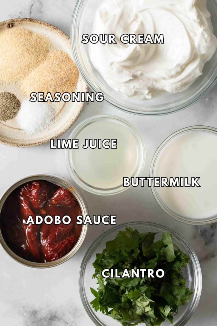 Chipotle Sauce Recipe Clear glass bowls filled with sour cream, buttermilk, lime juice, adobo sauce and cilantro for Chipotle Sauce recipe.