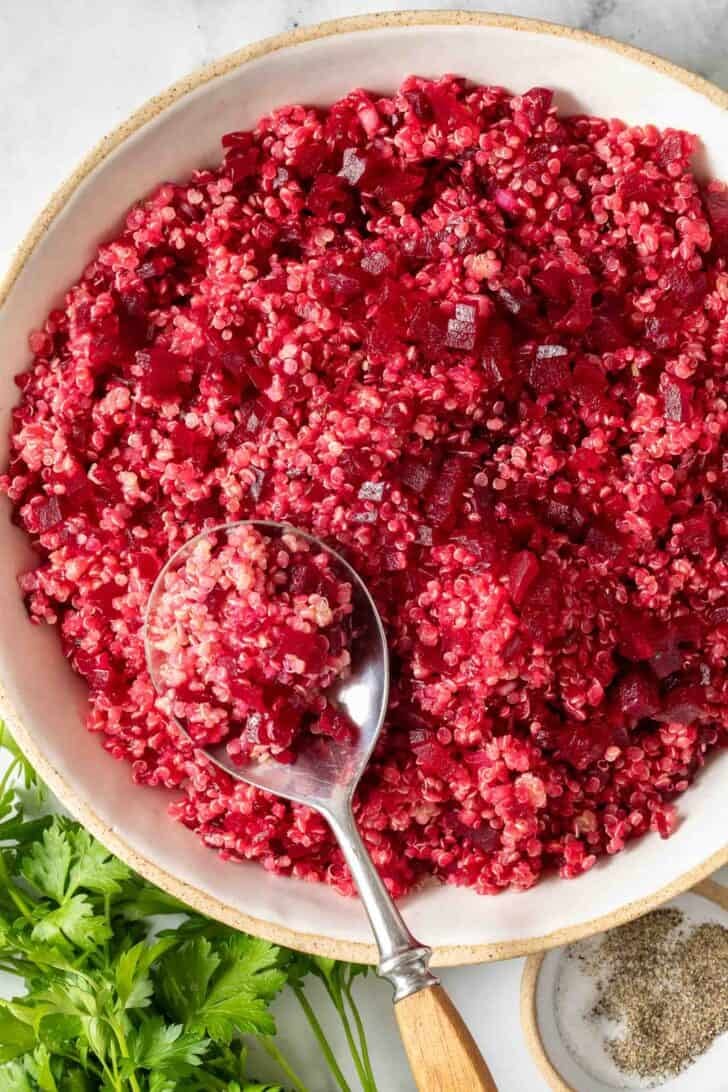 Quinoa With Beets Cooked Quinoa with Beets in a bowl.
