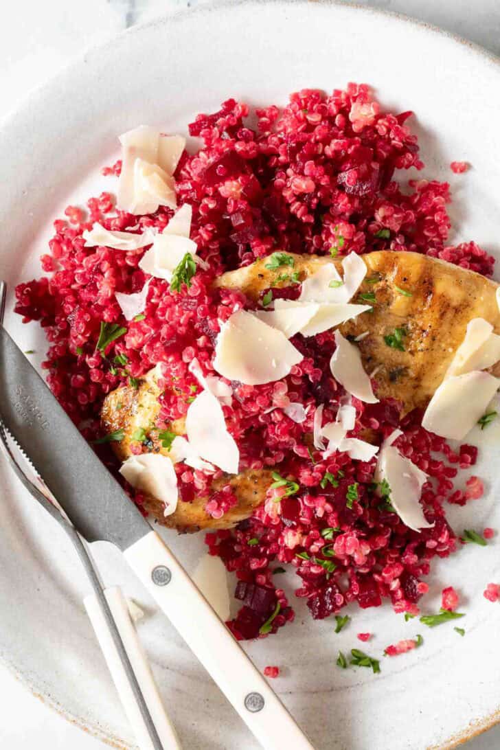 How to Make Beet Quinoa Beet Quinoa on a plate with grilled chicken.
